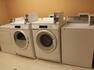 Coin Operated Washing and Drying Machines in Laundry Facility 