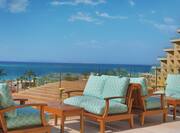 Balcony Area of the Onsite Coquina Lobby Bar Overlooking the Beach and the Red Sea Crystal Blue Water