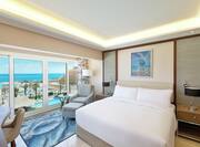 Suite with View of Sea and One King Bed with Desk and Workspace