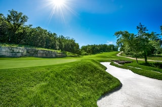 golf course with sand trap at Branson Hills Golf Club