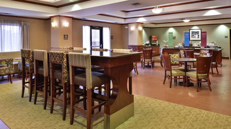 Community Table in Lobby and View of Dining Area in Background