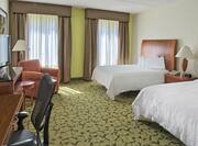Accessible Two Queen Guestroom with Beds, Lounge Area, Work Desk, and Room Technology