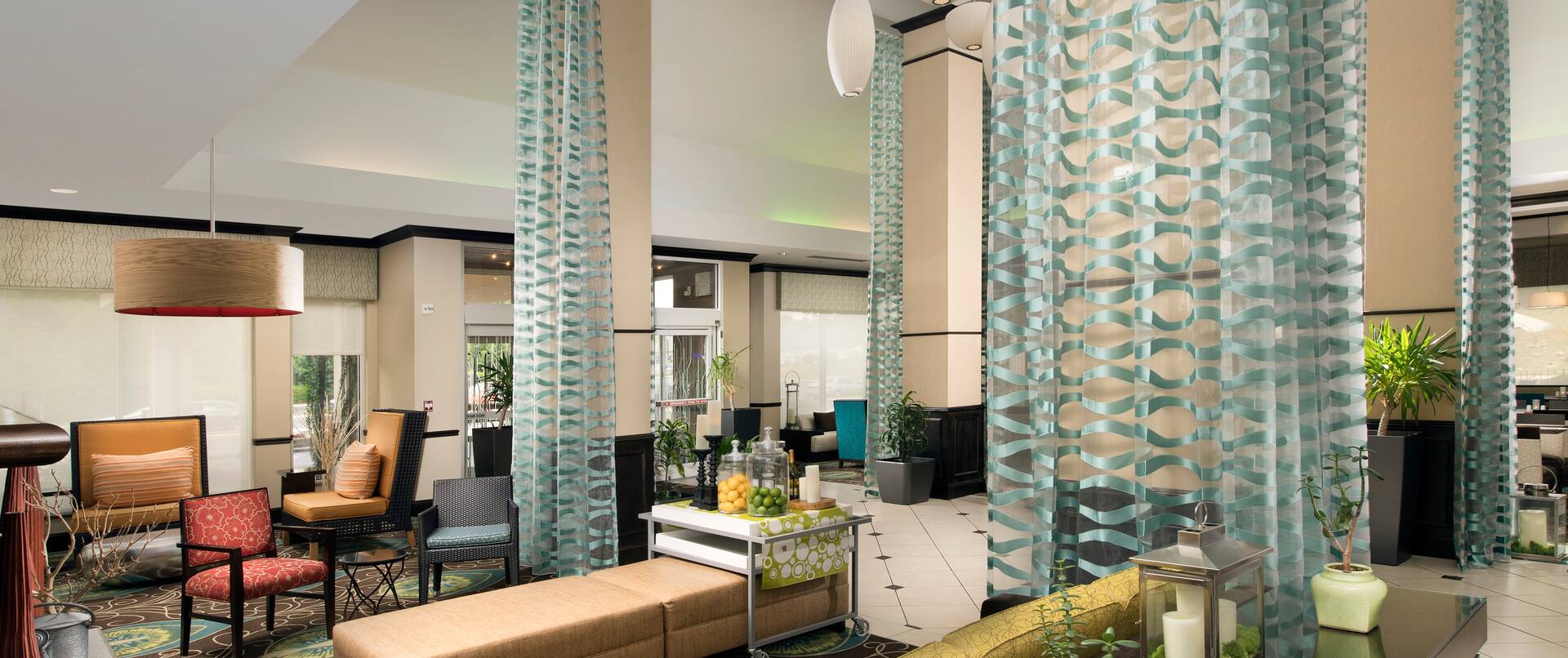 Full View of Hotel Lobby Lounge Area With Beverage Station