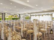 ballroom with wedding ceremony setup
