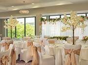 wedding reception setup with round tables