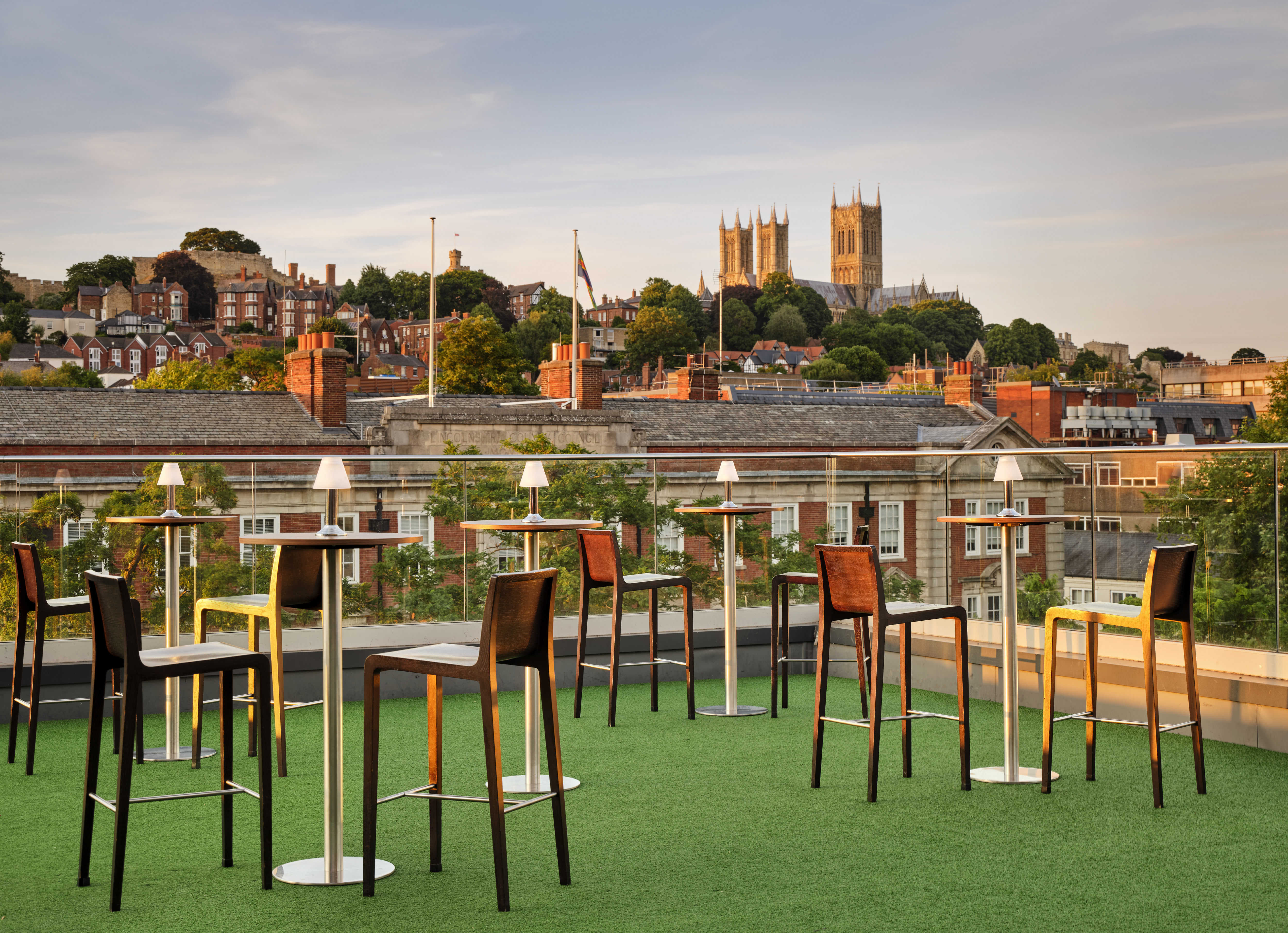 outdoor rooftop patio with tables