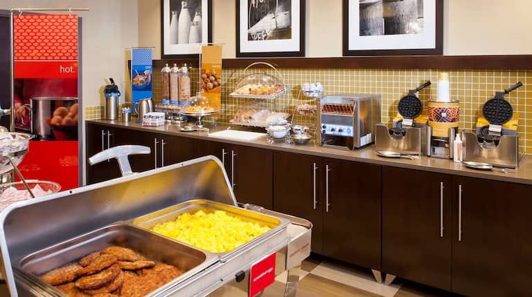 Breakfast Buffet with Hot Foods Cereals and Breads