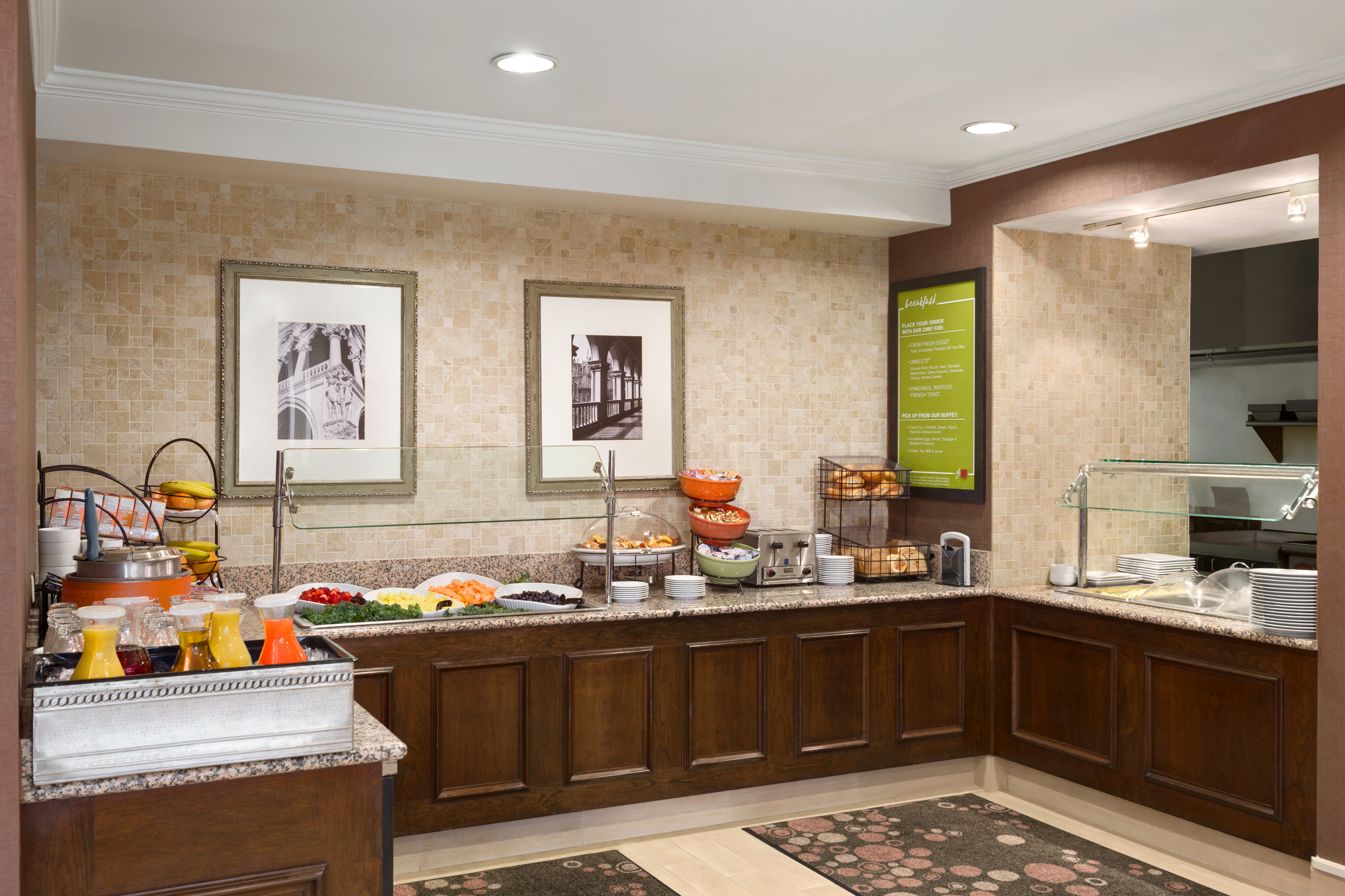 Breakfast Area at Garden Grille with Juices, Fruit  Cereal, and Various Breads