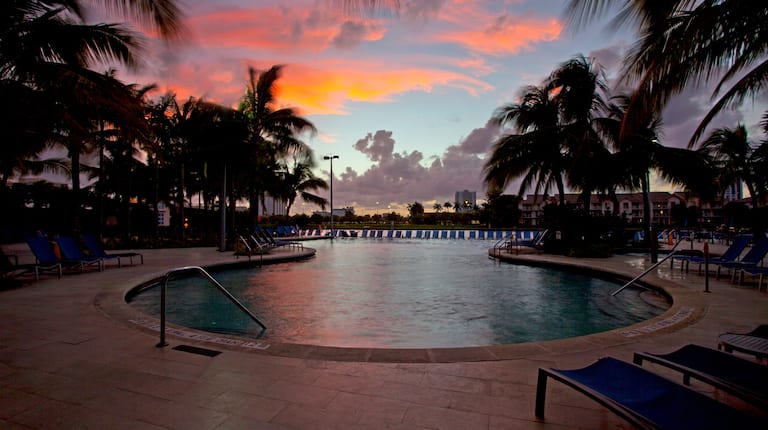 Pool Deck with beautiful sunset inbackground