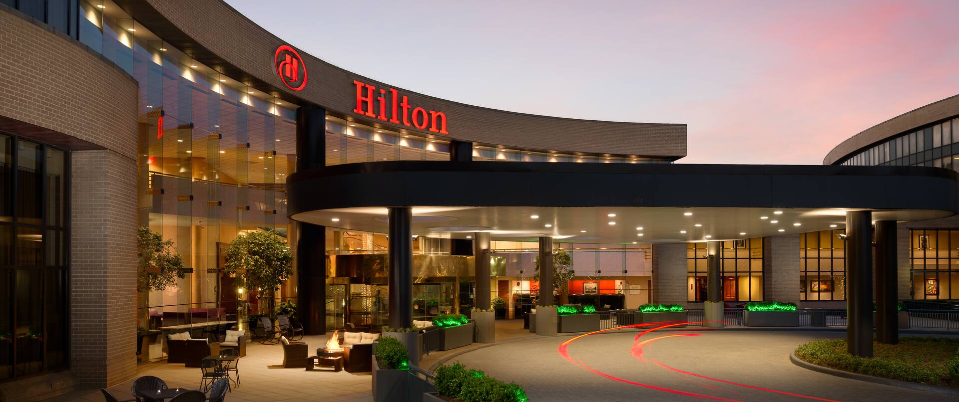 Exterior Entrance to Hilton Hotel at Sunset