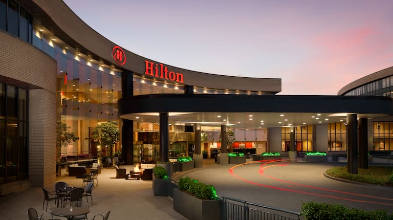 Exterior Entrance to Hilton Hotel at Sunset