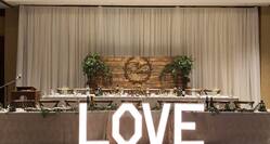 Meeting space with lights, spelling the word love