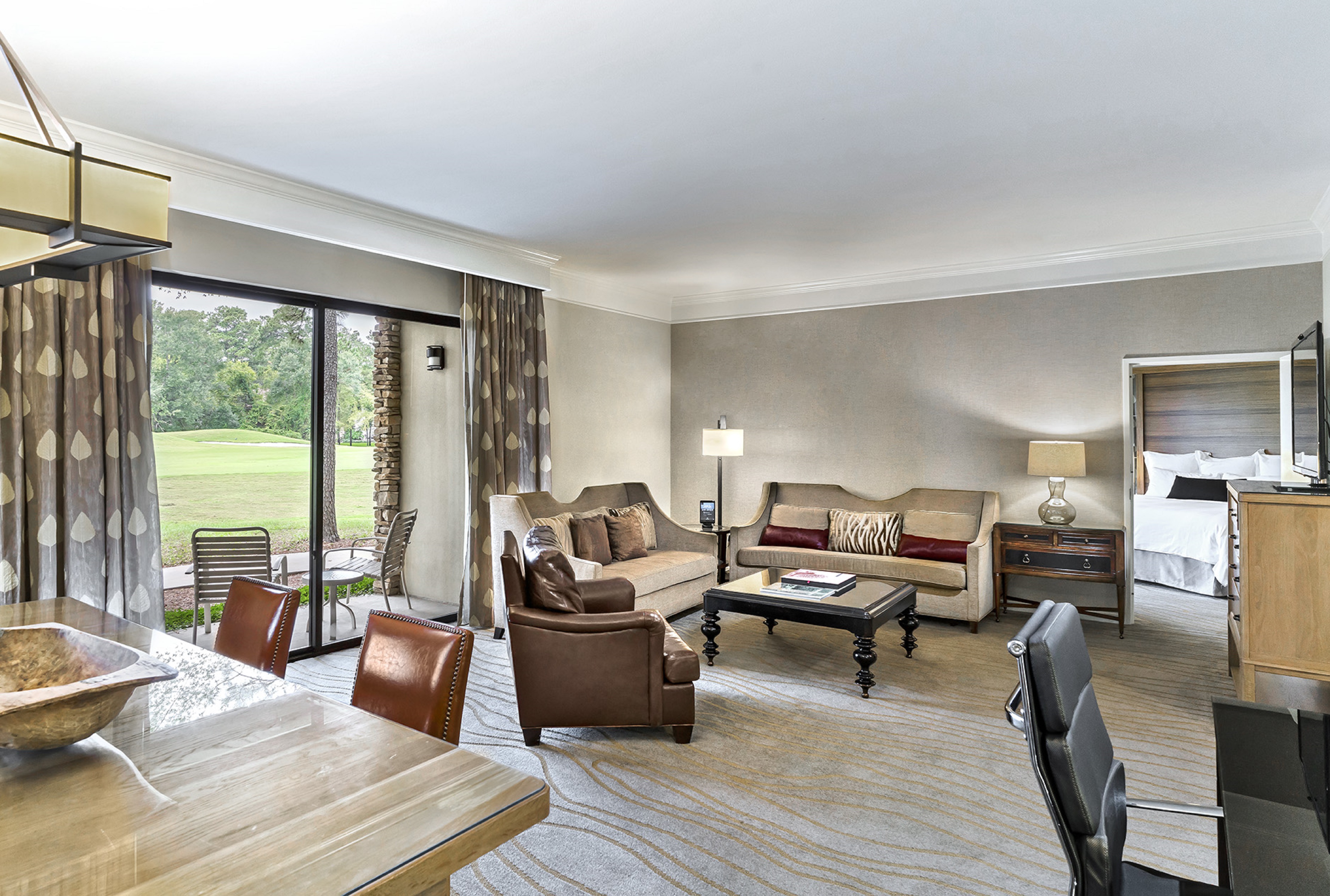 suite living area with golf course view