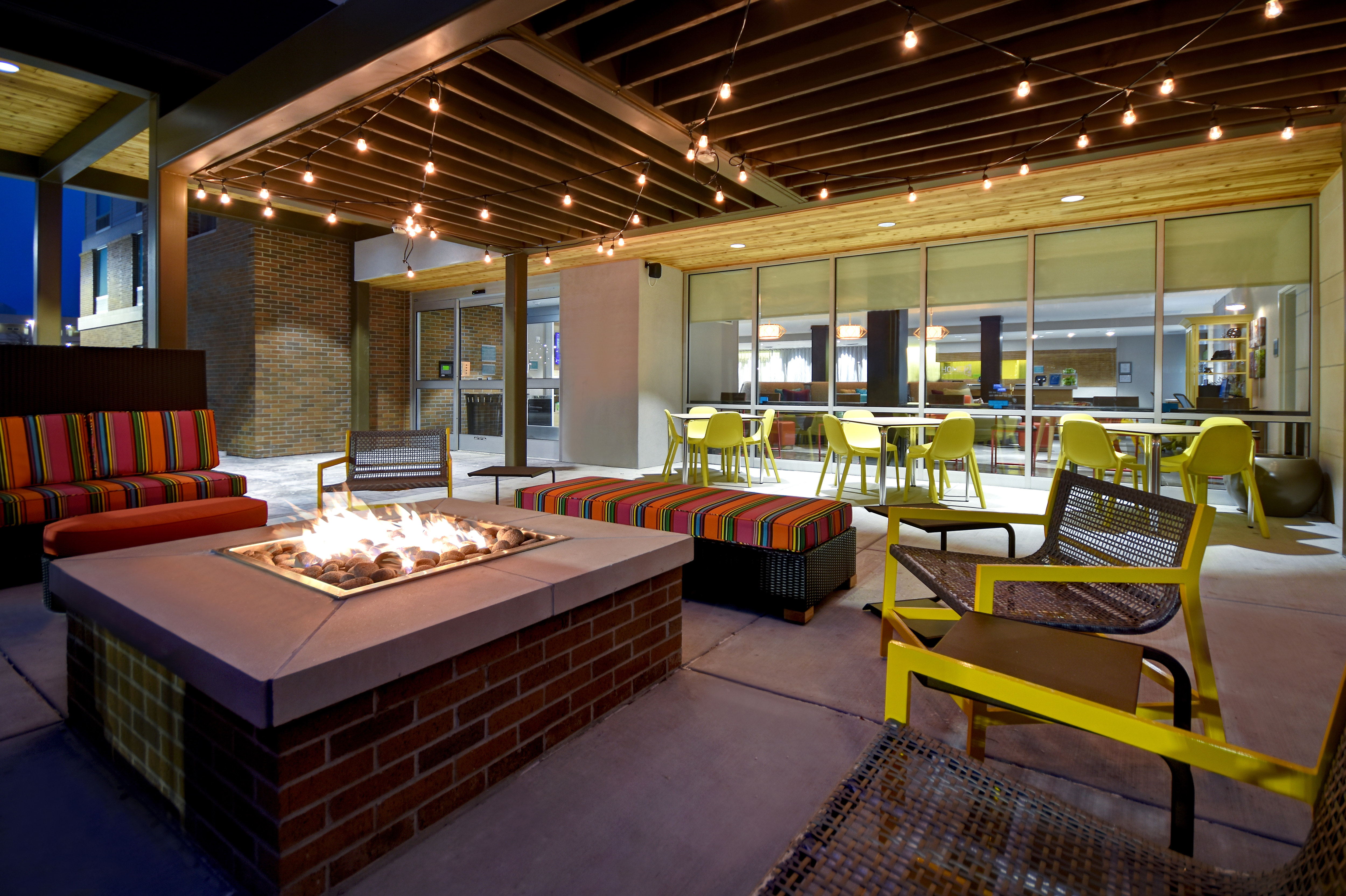outdoor patio with firepit at dusk