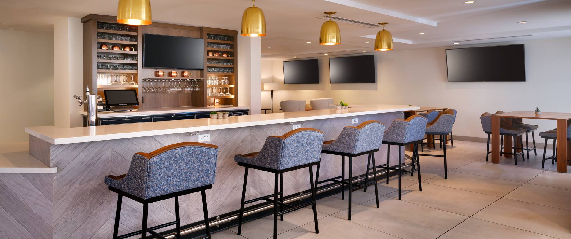 Bar Area with Four HDTVs and Chairs