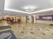 DoubleTree Hotel Lobby with Front Desk and Room Technology