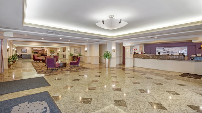 DoubleTree Hotel Lobby with Front Desk and Room Technology