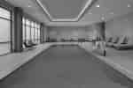 Interior Pool Area with Handicap Seat and Lounge Seating