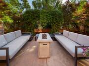 Outdoor Patio Area with Two Sofas and Firepit