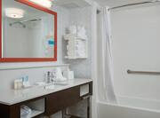 Bathroom with tub and sink