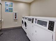 Coin operated guest laundry