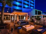 Outdoor Patio With Cabanas Seating At Night