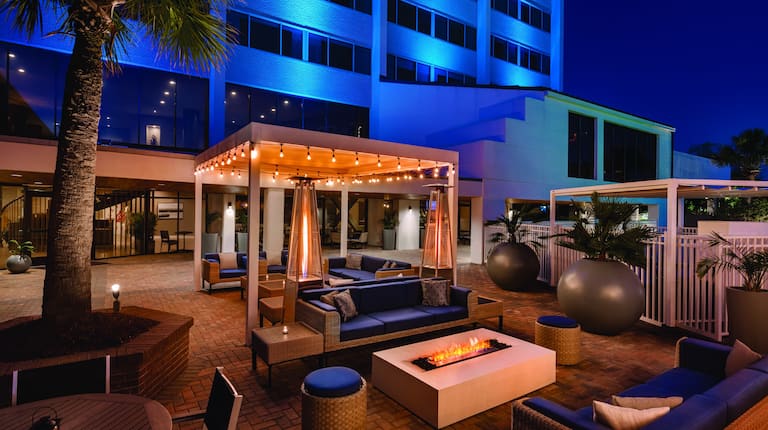 Outdoor Patio With Cabanas Seating At Night