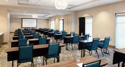 Meeting Room Setup Classroom Style with a Projection Screen