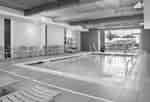 An Indoor Pool and Lounge Chairs