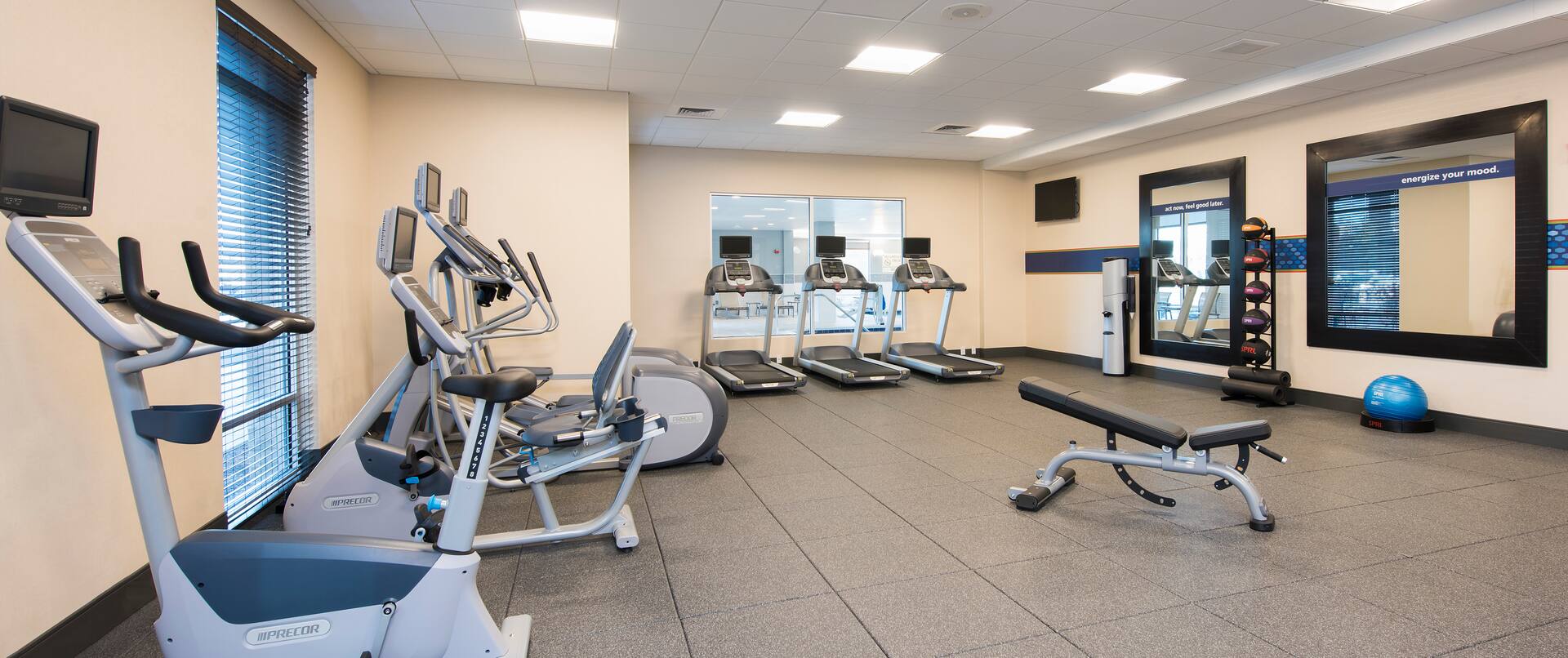 Fitness Center with Cycle Machines and Treadmills