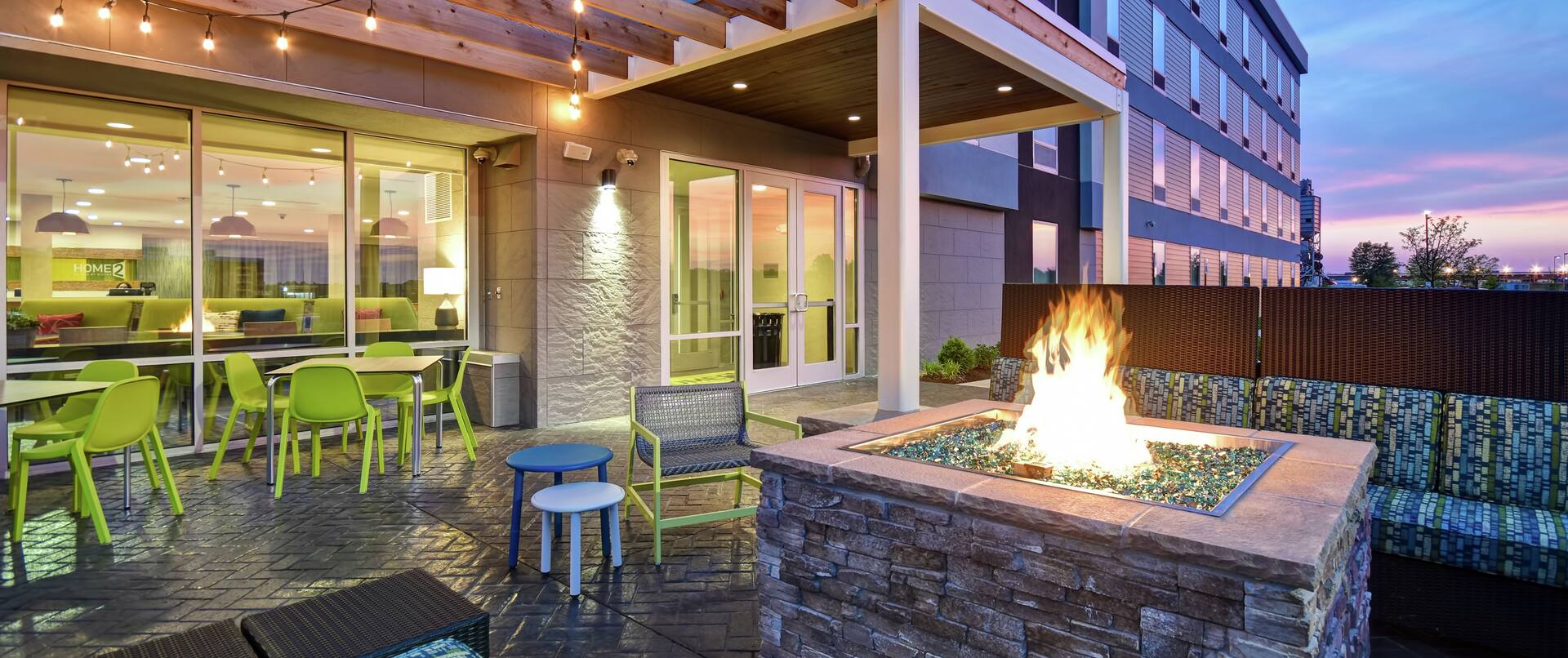 Outdoor firepit with tables and chairs