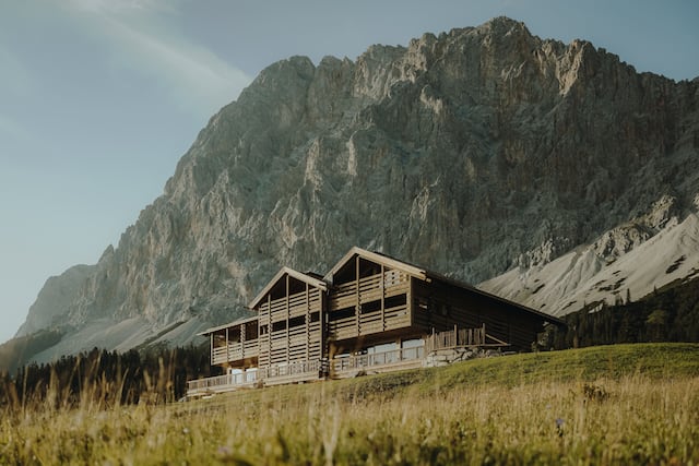 Hotel exterior with a mountain in the background