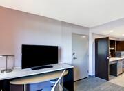 Guestroom with Kitchen, Work Desk and Television