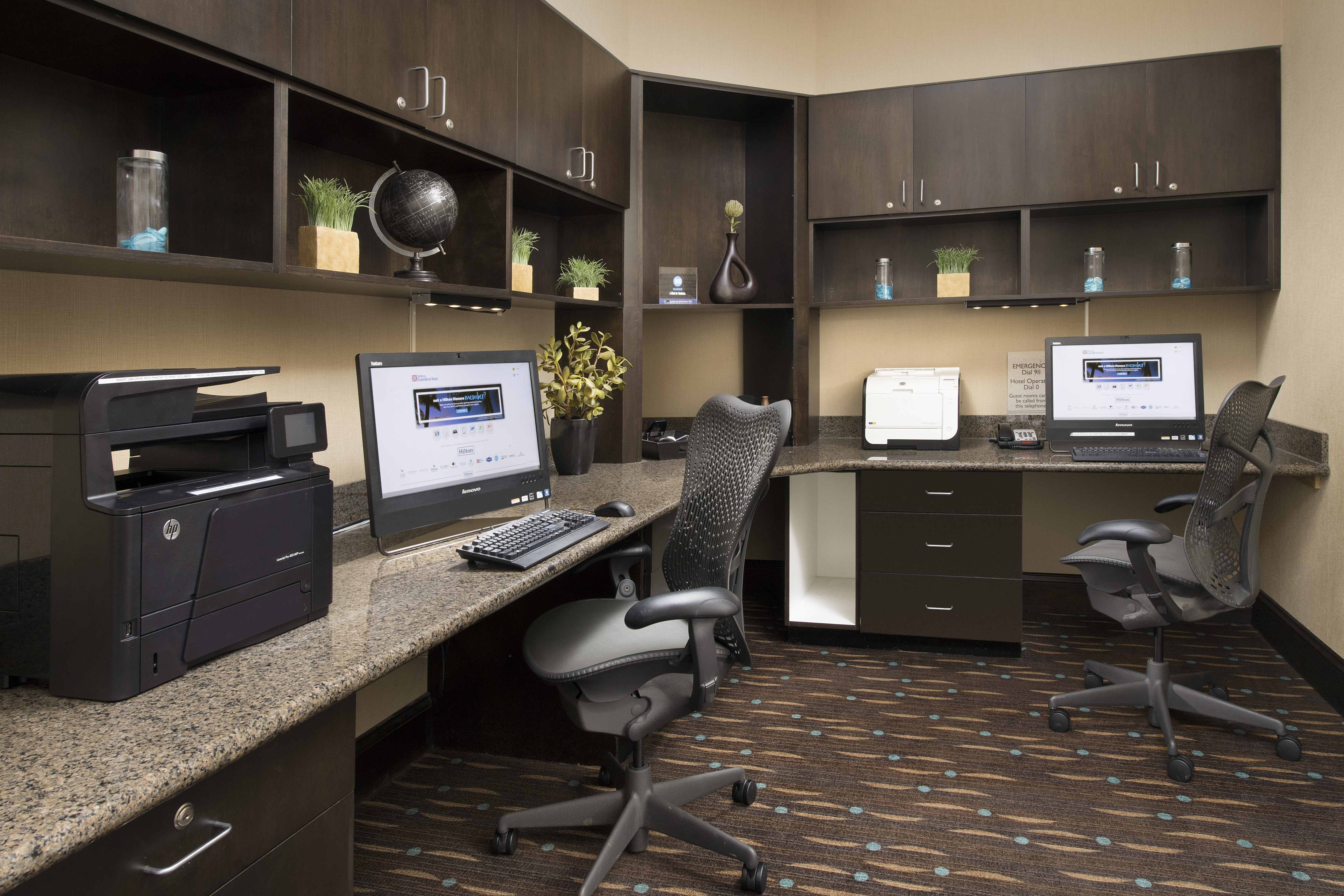 Business Center With Overhead Cabinets, Two Computer Workstations With Ergonomic Chairs, and Printer/Fax/Copier