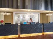 Lobby front desk with staff