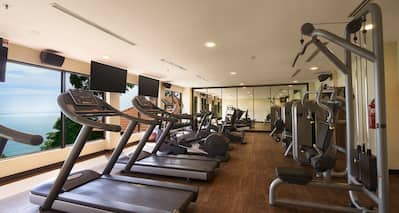 Fitness center treadmills and weight machines