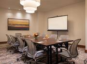 Conference Room With Projector Screen