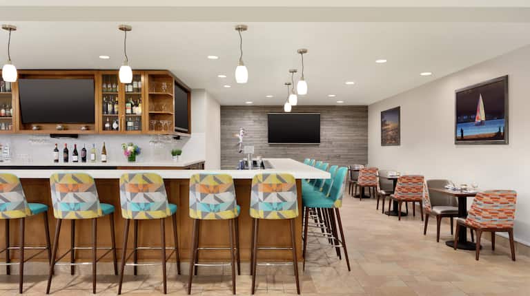 Spacious on-site bar featuring ample seating, stylish design, and delicious beer on tap.