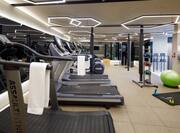 Fitness Center with Treadmills and Other Modern Equipment
