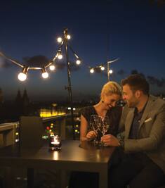 Couple at Dinner on a Rooftop