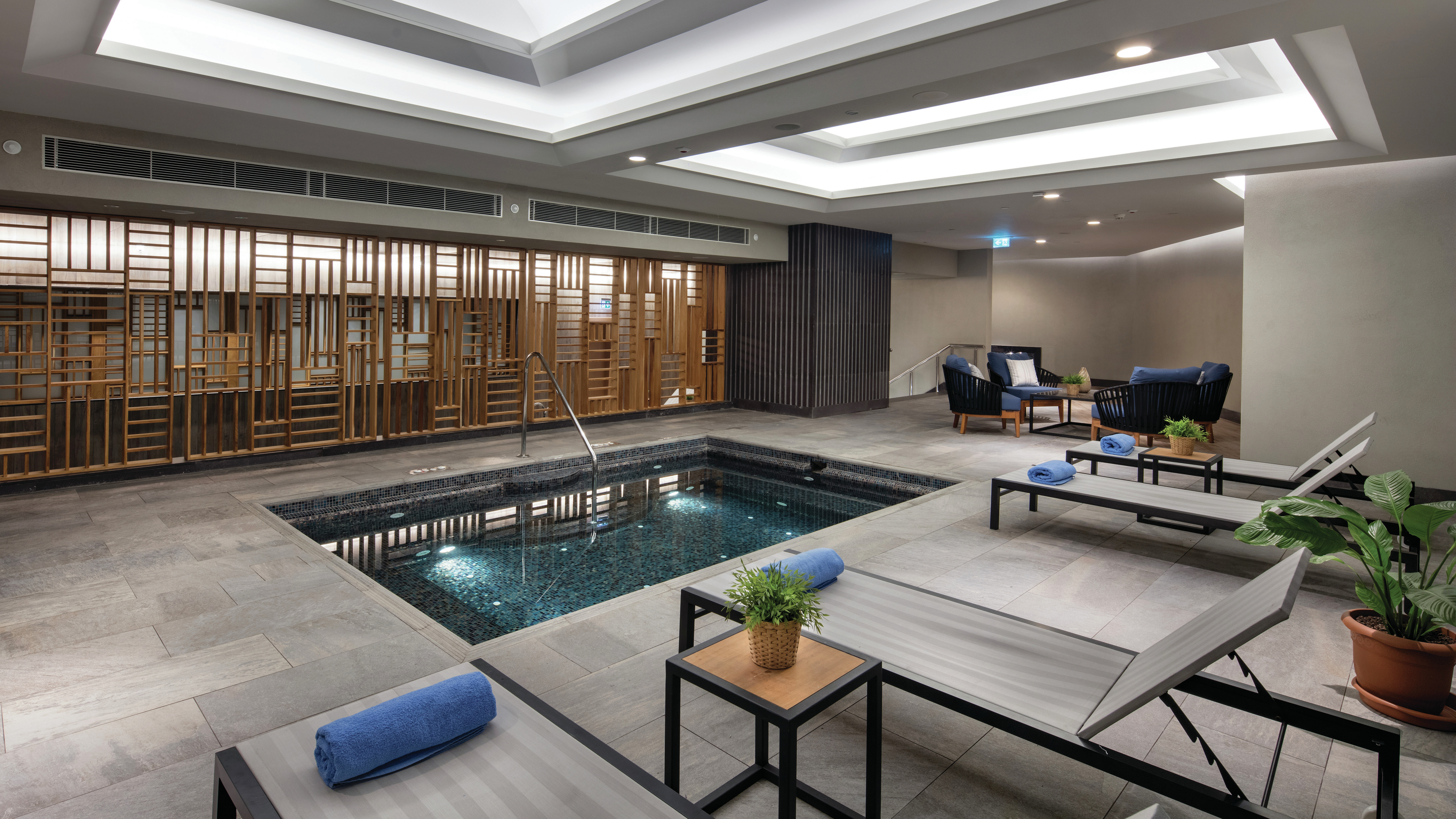 Jetted Pool with Lounge Chairs