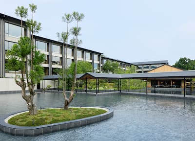Exterior View of Hotel Surrounded by Water