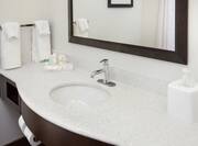 Guest Room Bathroom with Vanity and Amenities 