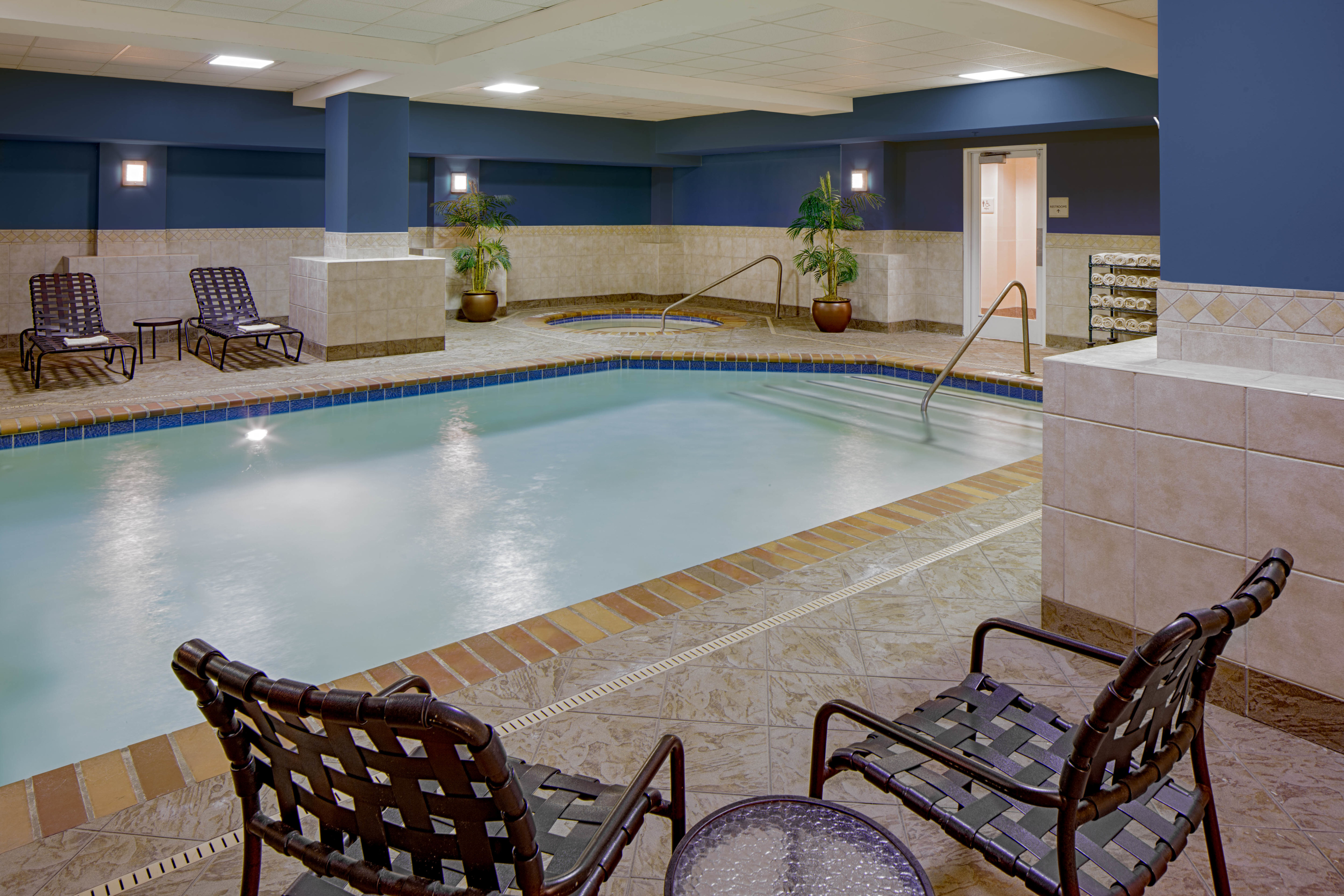 Indoor Pool Area with seating