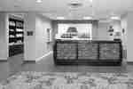 Wall Art Behind Front Desk and View of Snack Shop