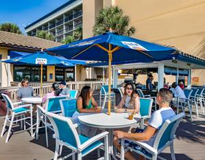 Tides Beach Bar and Grille with guests