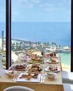 Table by Window with View of Sea, Full Meal Set