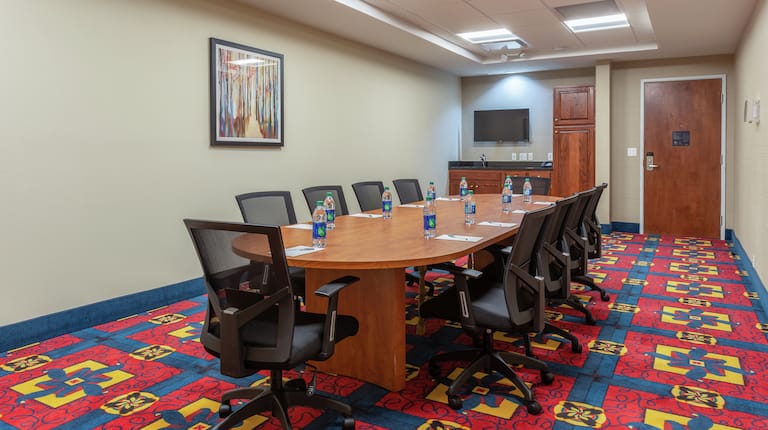 Boardroom with Large Meeting Table and Office Chairs
