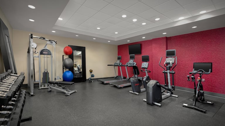 on site fitness center, free weights, yoga balls, treadmills, ellipticals