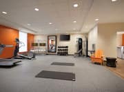 Fitness Center with Treadmill, Cross-Trainer and Weight Machine